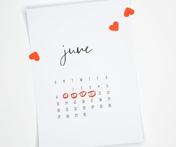 A calendar with circled dates showing a consistent yoga practice schedule.